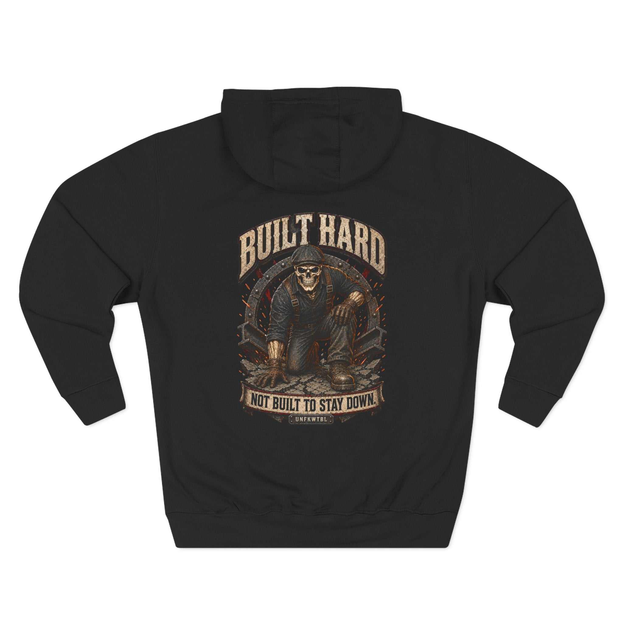 Back of a black UNFKWTBL hoodie with a skeleton worker and “Not Built to Stay Down” graphic.
