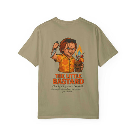 Unisex beige T-shirt featuring Chucky holding a knife and a flaming cocktail with text "The Little Bastard" and a description of Chucky’s signature cocktail.