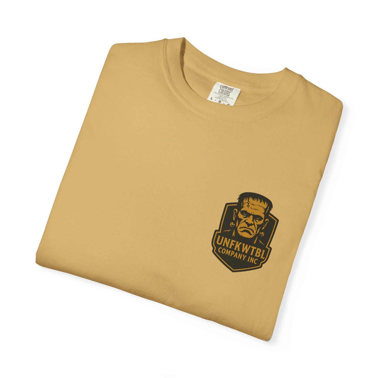 Vintage Frankenstein T-shirt in tan with bold monster graphic and UNFKWTBL logo on chest, unisex garment-dyed cotton tee.