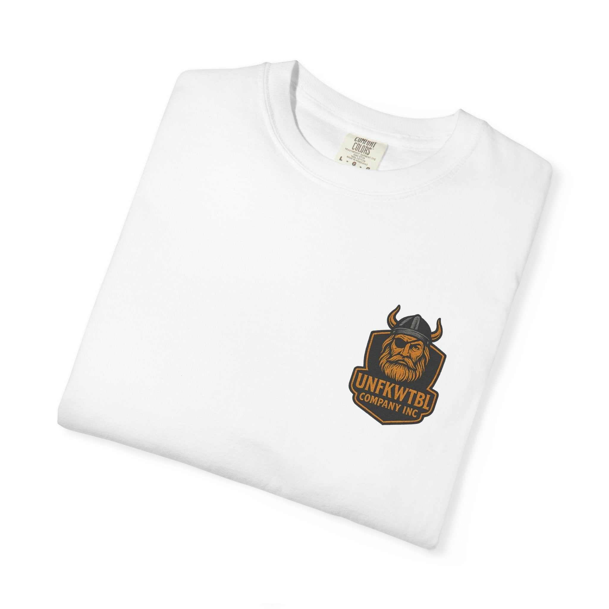 Folded white Tropical Humor T-Shirt with small Viking logo on chest, casual unisex garment-dyed cotton tee.