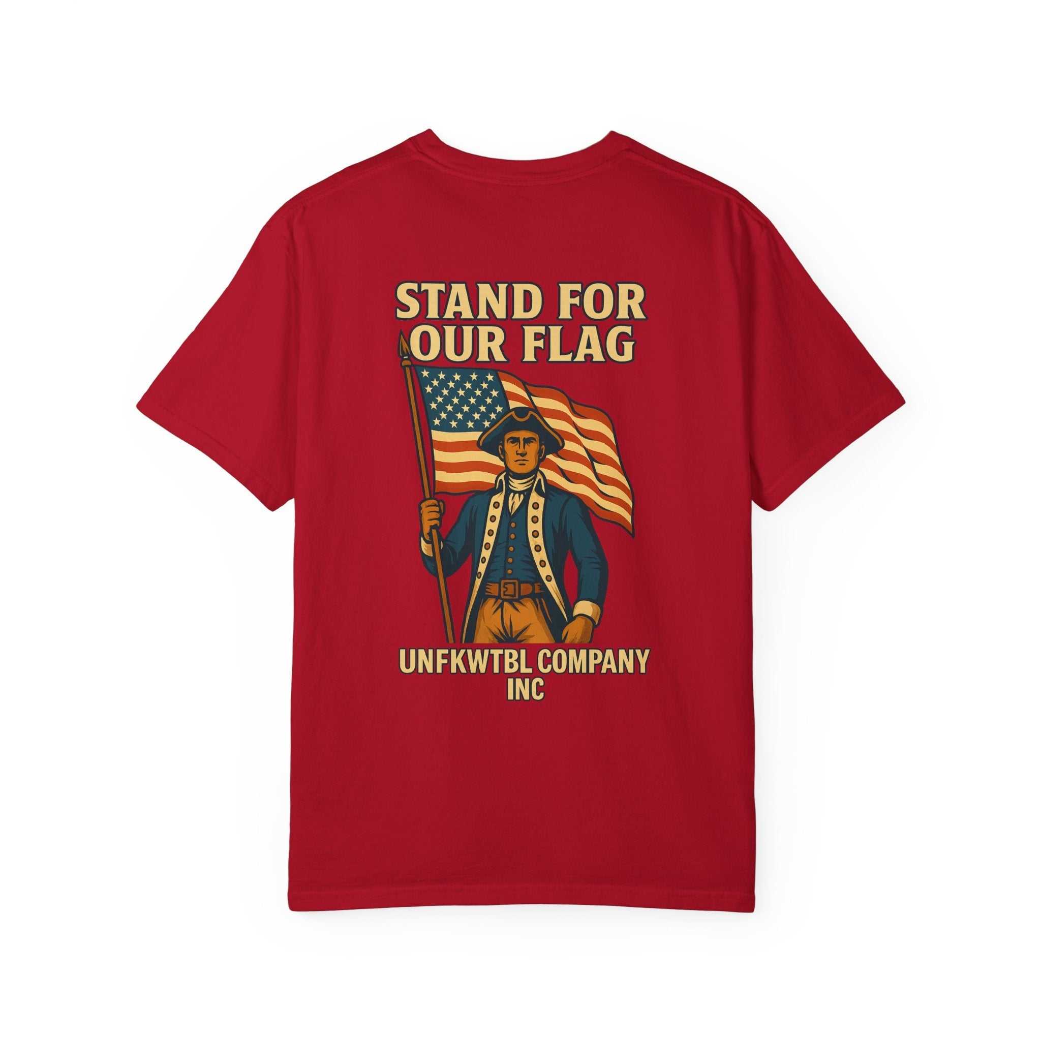 Red vintage-inspired unisex patriotic T-shirt featuring a colonial figure holding an American flag and bold "Stand For Our Flag" text.