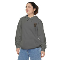Unisex garment-dyed hoodie in gray with skull graphic, relaxed fit, cotton-polyester blend.