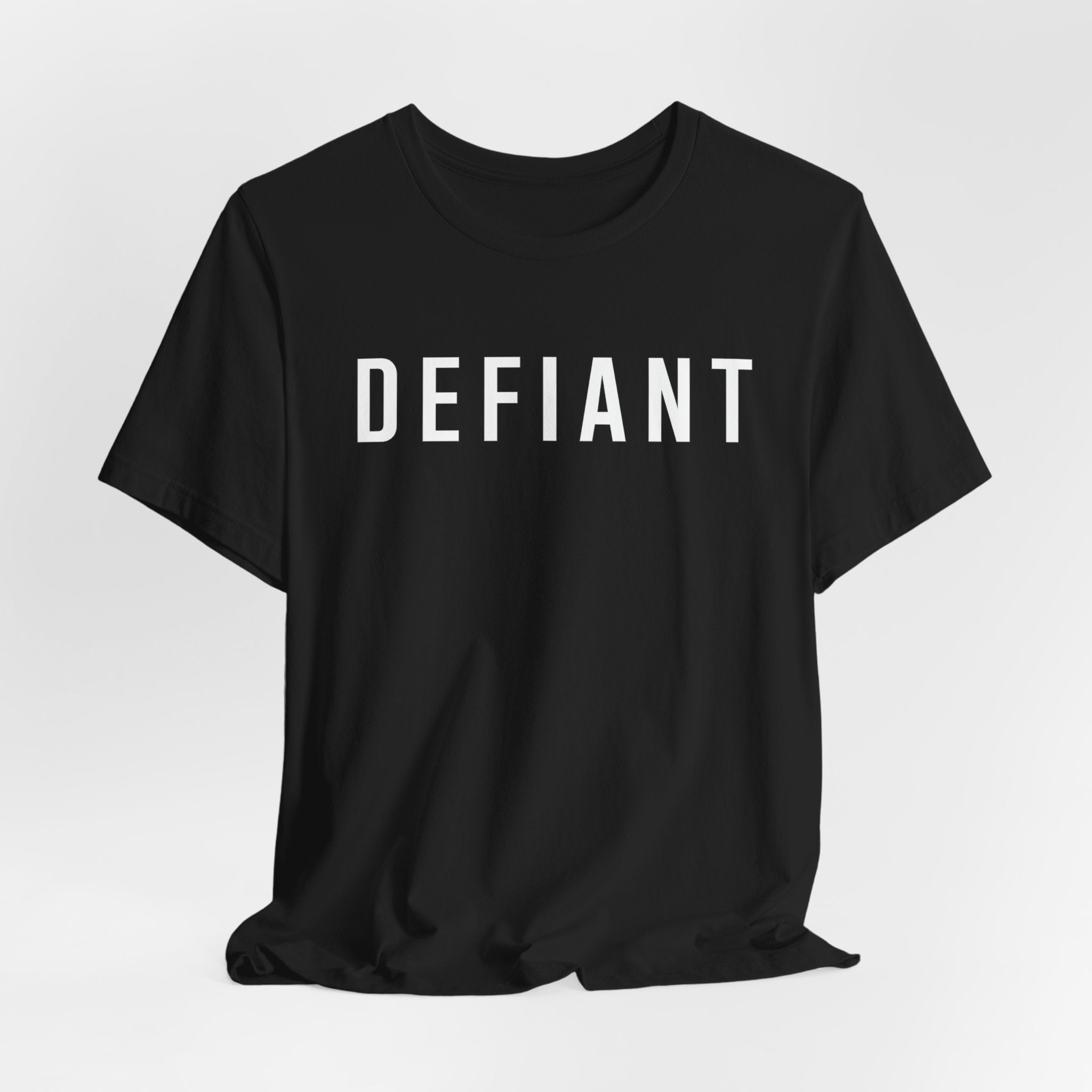 Defiant Graphic Tee — Minimal Bold Text T‑Shirt for Rebels & Statement Makers