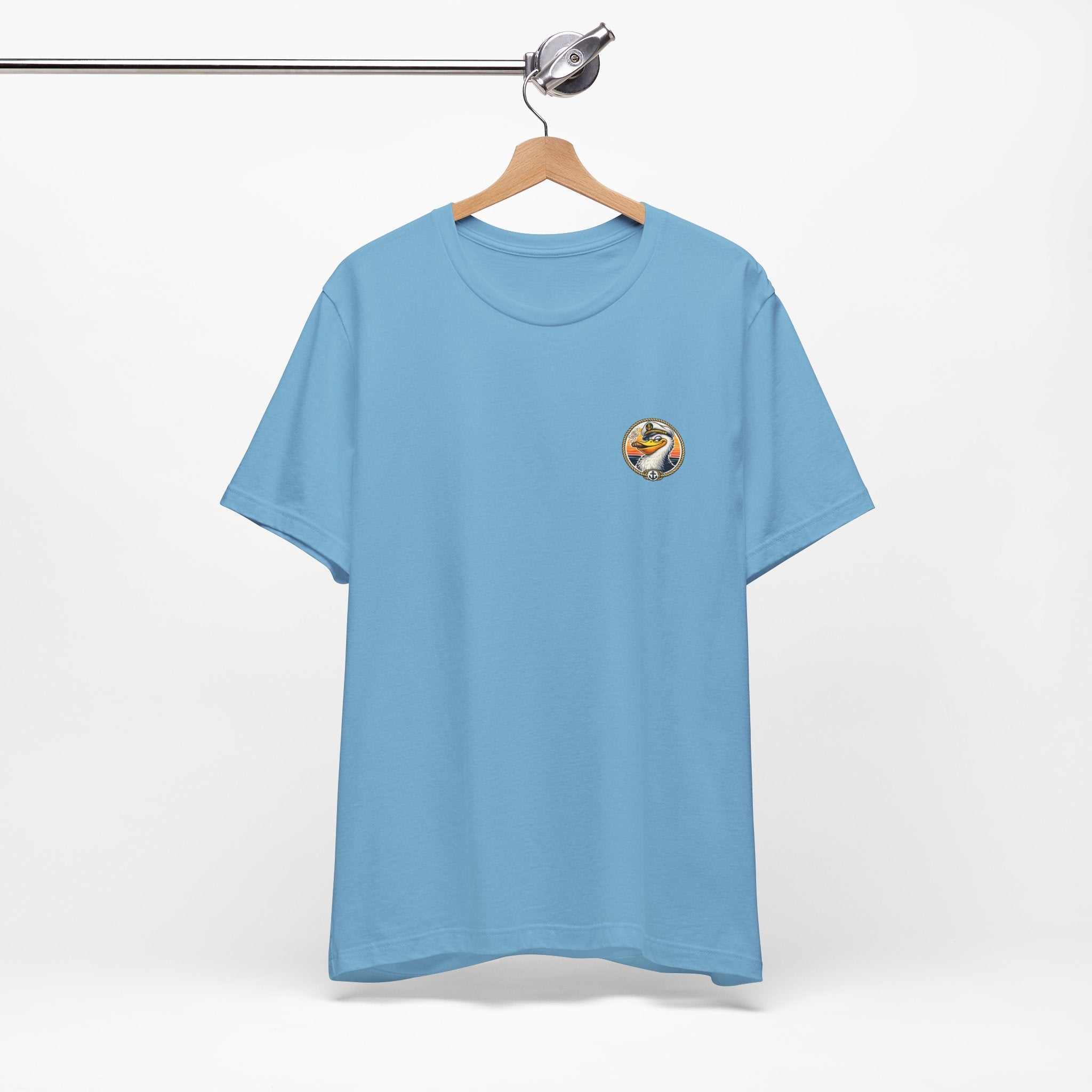 T-Shirt — Retro Pelican on Inflatable Tube Graphic Tee (Beach Vacation, Tropical Sunset)