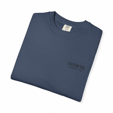 Folded navy blue Chucky Cocktail unisex T-shirt made of soft 100% US cotton with subtle logo print.