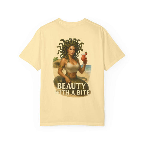 Medusa Beauty unisex T-shirt with Medusa holding a strawberry daiquiri and "Beauty with a Bite" text on a light beige background