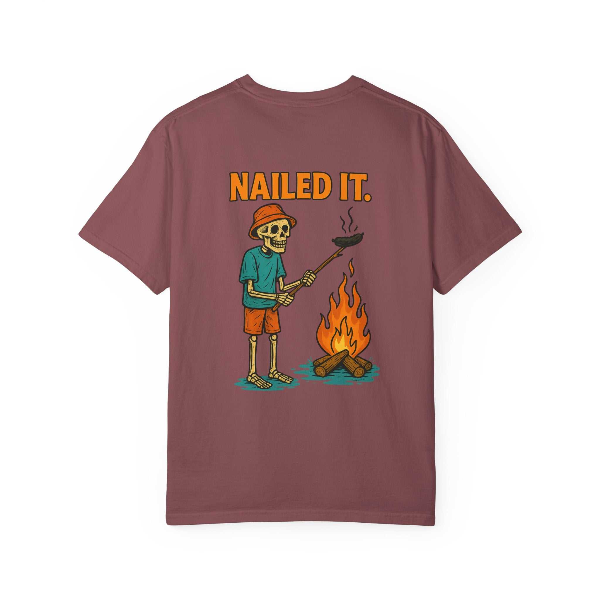 Chill skeleton T-shirt with playful campfire design and "NAILED IT" text on vintage washed cotton tee
