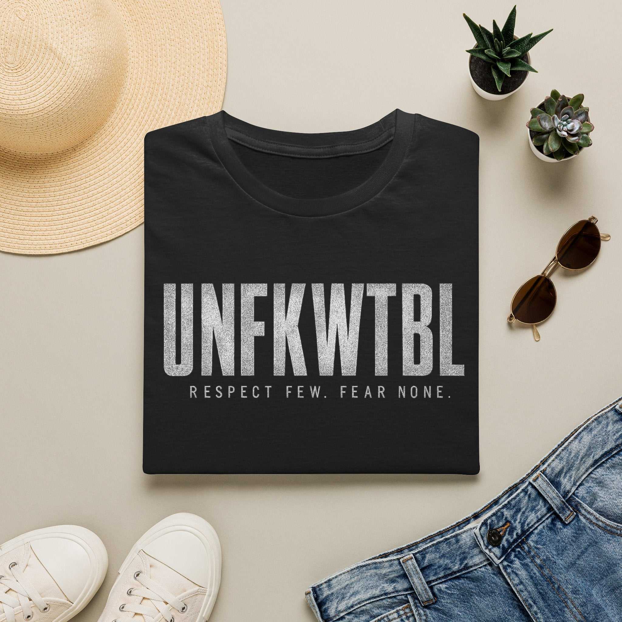 UNFKWTBL T-Shirt featuring bold distressed "Respect Few. Fear None." print on soft ring-spun cotton tee
