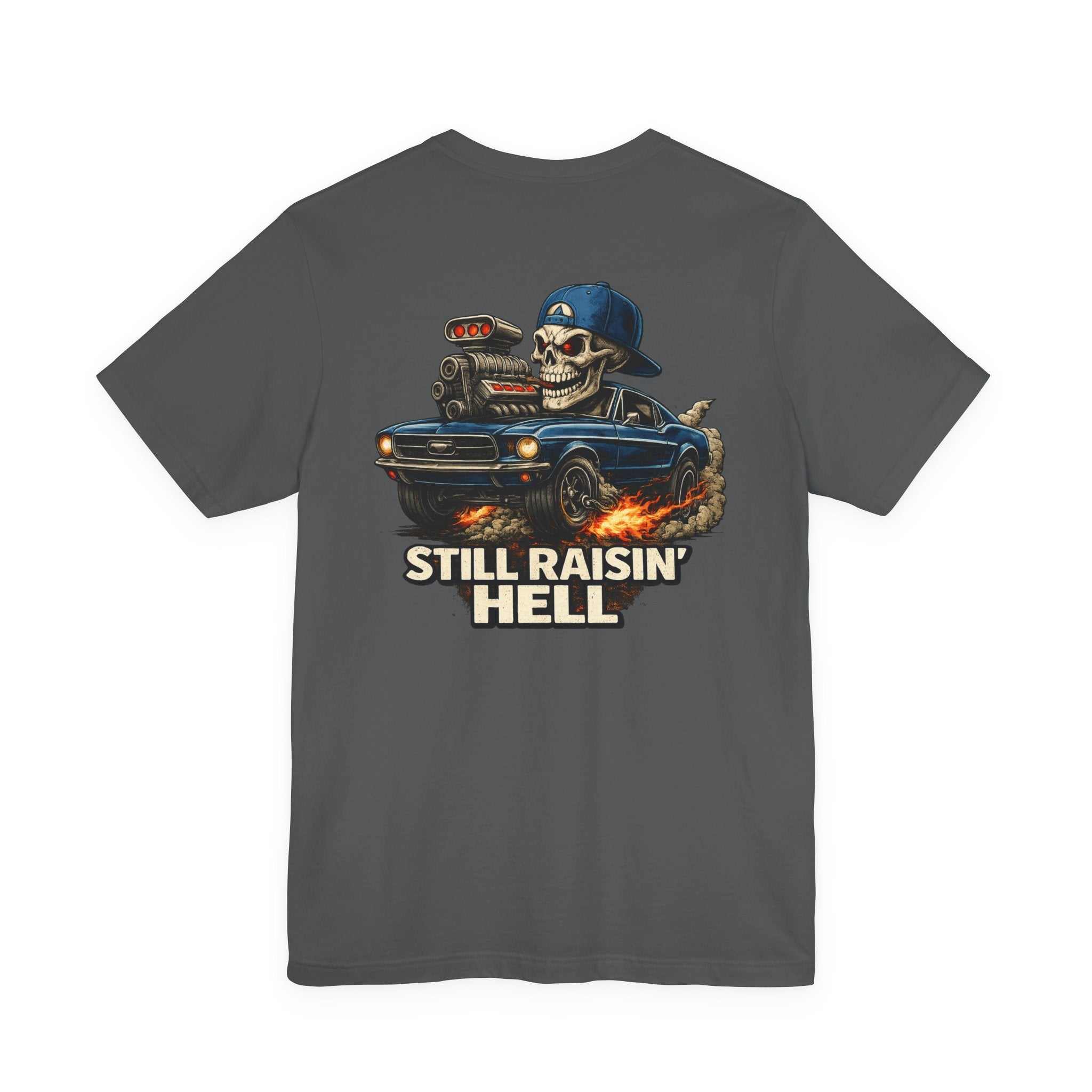 Still Raisin' Hell T-Shirt with skull driving smoking muscle car graphic on lightweight cotton tee