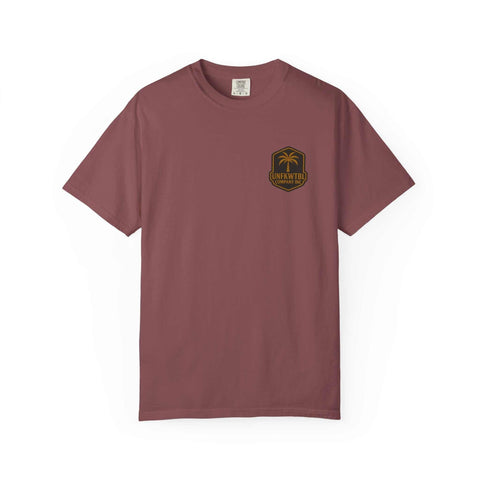 Unisex maroon garment-dyed t-shirt with small black and yellow palm tree logo, casual beachwear for summer fun and horror fan gifts