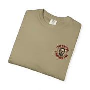 Folded beige Revenge T-shirt with Jason Voorhees graphic and UNFKWTBL Company Inc logo on chest