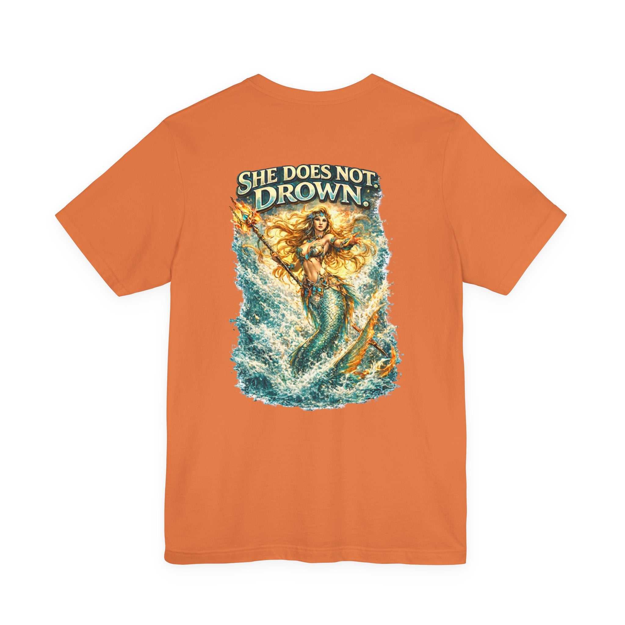 She Does Not Drown Mermaid Graphic Tee — Empowering Ocean Goddess T-Shirt