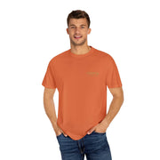 Medusa Beauty Unisex T-shirt in orange with subtle design, relaxed fit, crew neckline, worn by male model