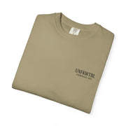 Folded khaki Chucky Cocktail unisex T-shirt with UNFKWTBL Company Inc logo on chest