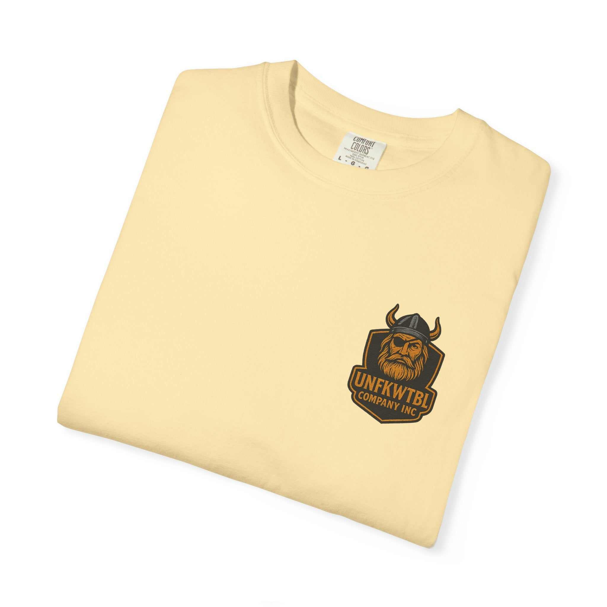 folded tropical humor t-shirt in light yellow with viking logo casual unisex garment-dyed summer tee beachwear vacation attire
