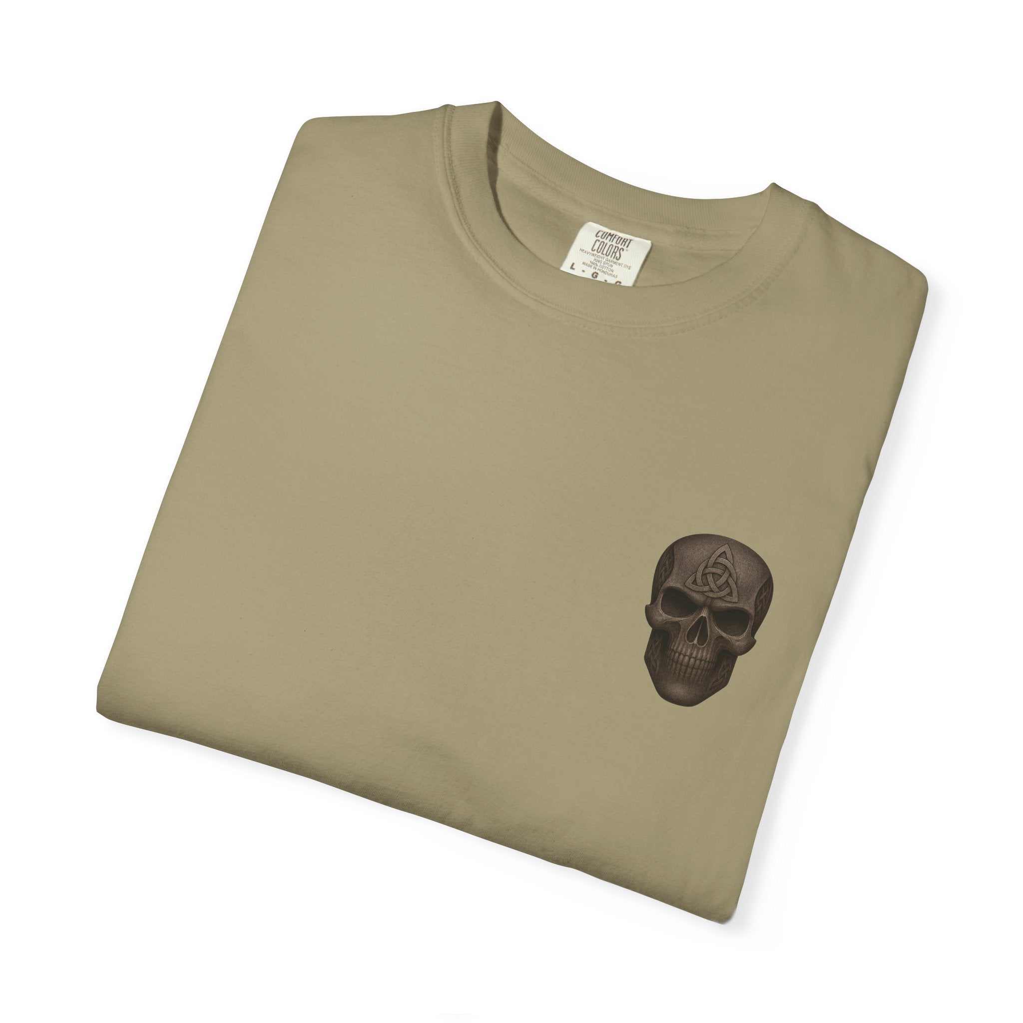 Folded beige vintage-inspired patriotic t-shirt with a small dark skull graphic on the chest, casual unisex style.