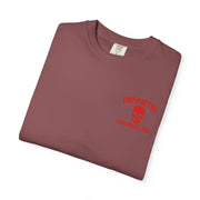 Folded maroon graphic tee with red Grim Reaper Hulk design and text logo on chest