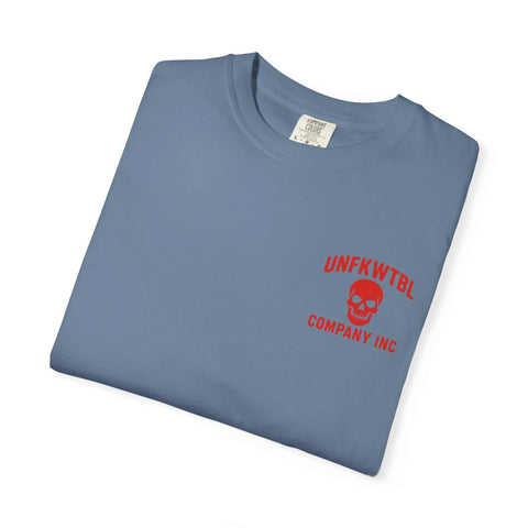 Folded blue graphic tee with red skull logo and text from UNFKWTBL Company Inc.