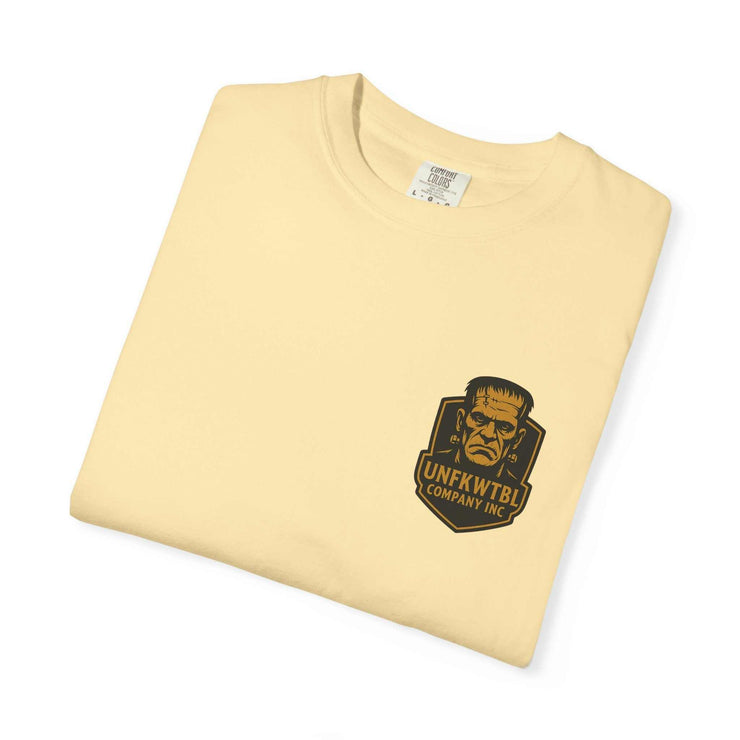 Folded vintage Frankenstein T-shirt in light yellow with graphic logo on front pocket area