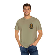 Man wearing vintage Frankenstein T-shirt in olive green with graphic print and crew neckline