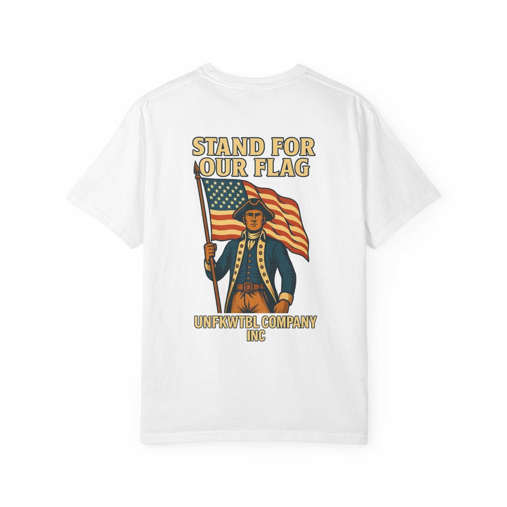 White vintage-inspired patriotic T-shirt with "Stand For Our Flag" graphic featuring a colonial soldier holding an American flag.