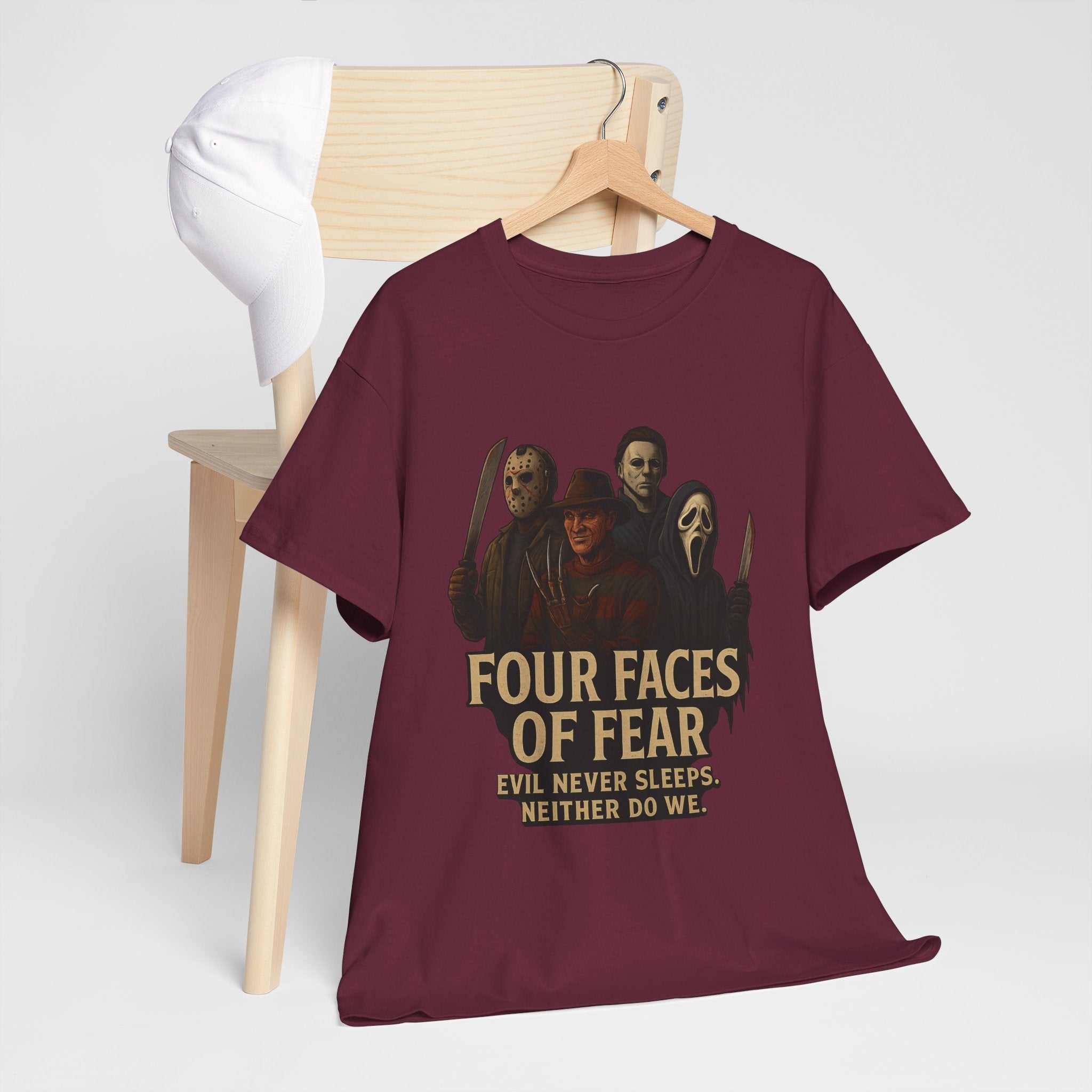 Horror Villains Tee featuring Michael, Freddy, Jason, and Ghostface faces on unisex T-shirt