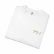 White folded Fantasy Battle unisex garment-dyed t-shirt with small gold logo on chest