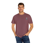 man wearing mauve killer cocktails design t-shirt with skull graphic on chest