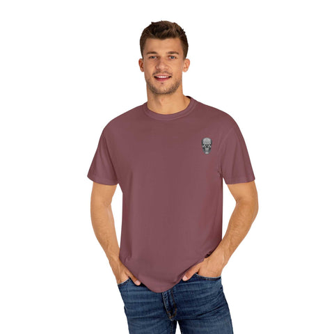 man wearing mauve killer cocktails design t-shirt with skull graphic on chest