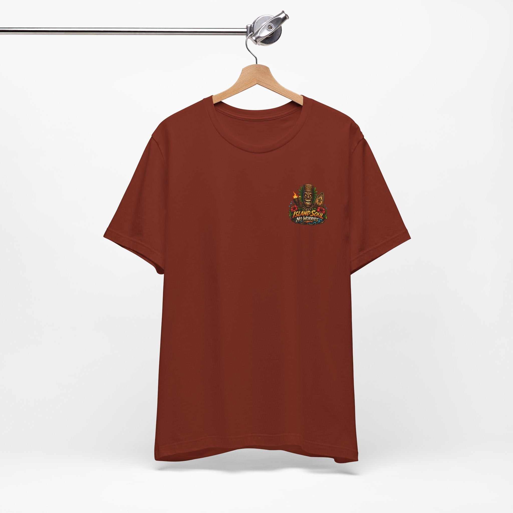 Tropical Tiki Tee with tiki, hibiscus flowers, and waves design on back, soft breathable island-inspired cotton shirt.