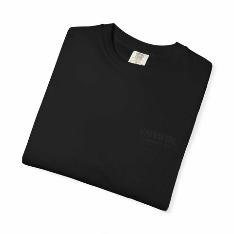 Folded black Chucky Cocktail unisex T-shirt made of 100% US cotton with soft garment-dyed fabric and relaxed fit.