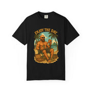 Black Atlas Enjoy the Day graphic t-shirt with relaxed fit, featuring a man lounging on a beach chair under palm trees, perfect for summer wear