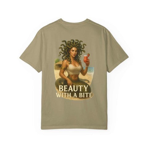 Medusa Beauty Unisex T-shirt with graphic of Medusa holding a strawberry daiquiri and text "Beauty with a Bite" on beige fabric