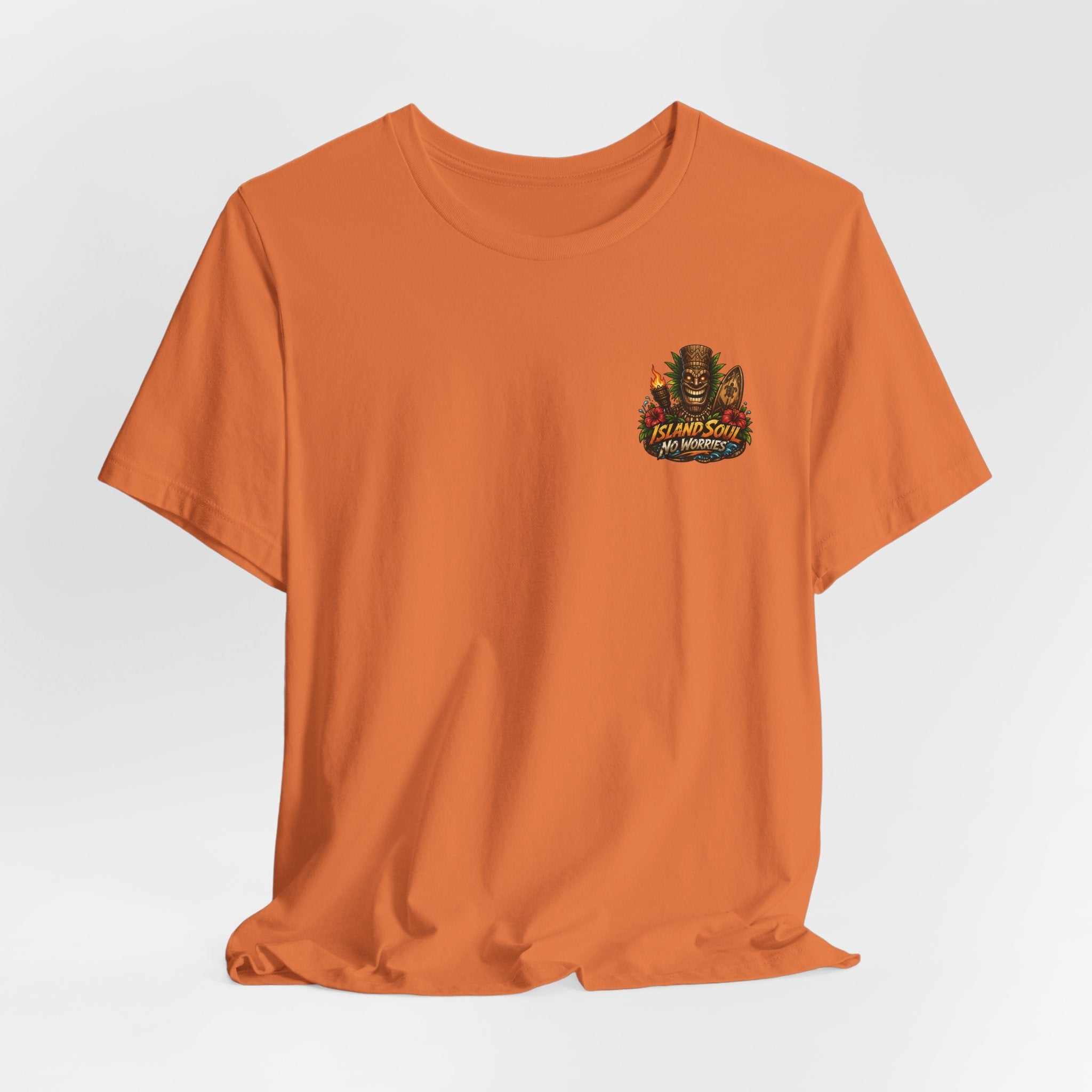 Tropical Tiki Tee with tiki design, hibiscus flowers, and waves on back, made from soft breathable cotton for island vibes.