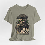 Dead & Lucky Skull Tee with grinning skull graphic and bold text on lightweight cotton t-shirt