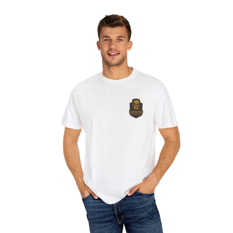 Man wearing white Bride of Frankenstein graphic T-shirt with logo on chest and blue jeans