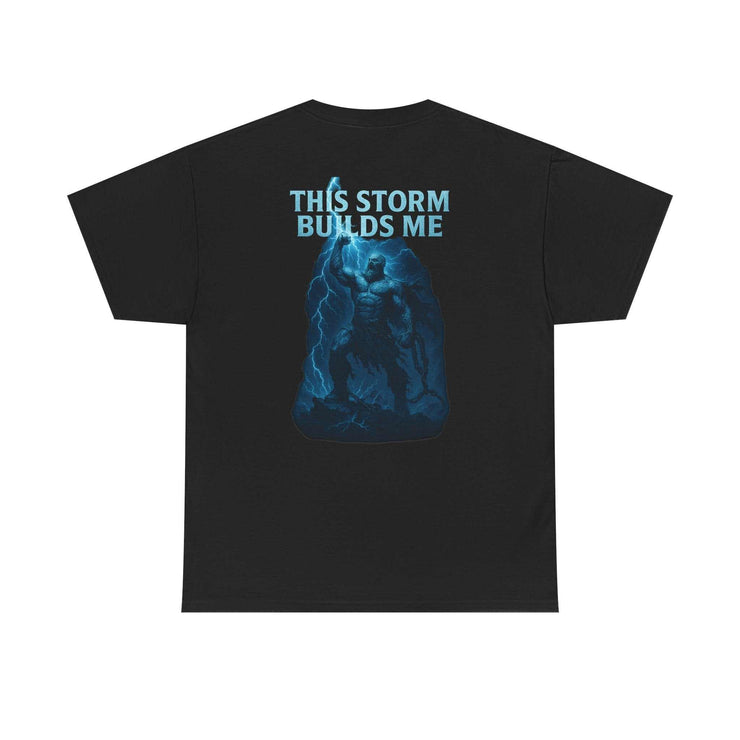 Black unisex heavy cotton tee with "This Storm Builds Me" graphic and powerful design