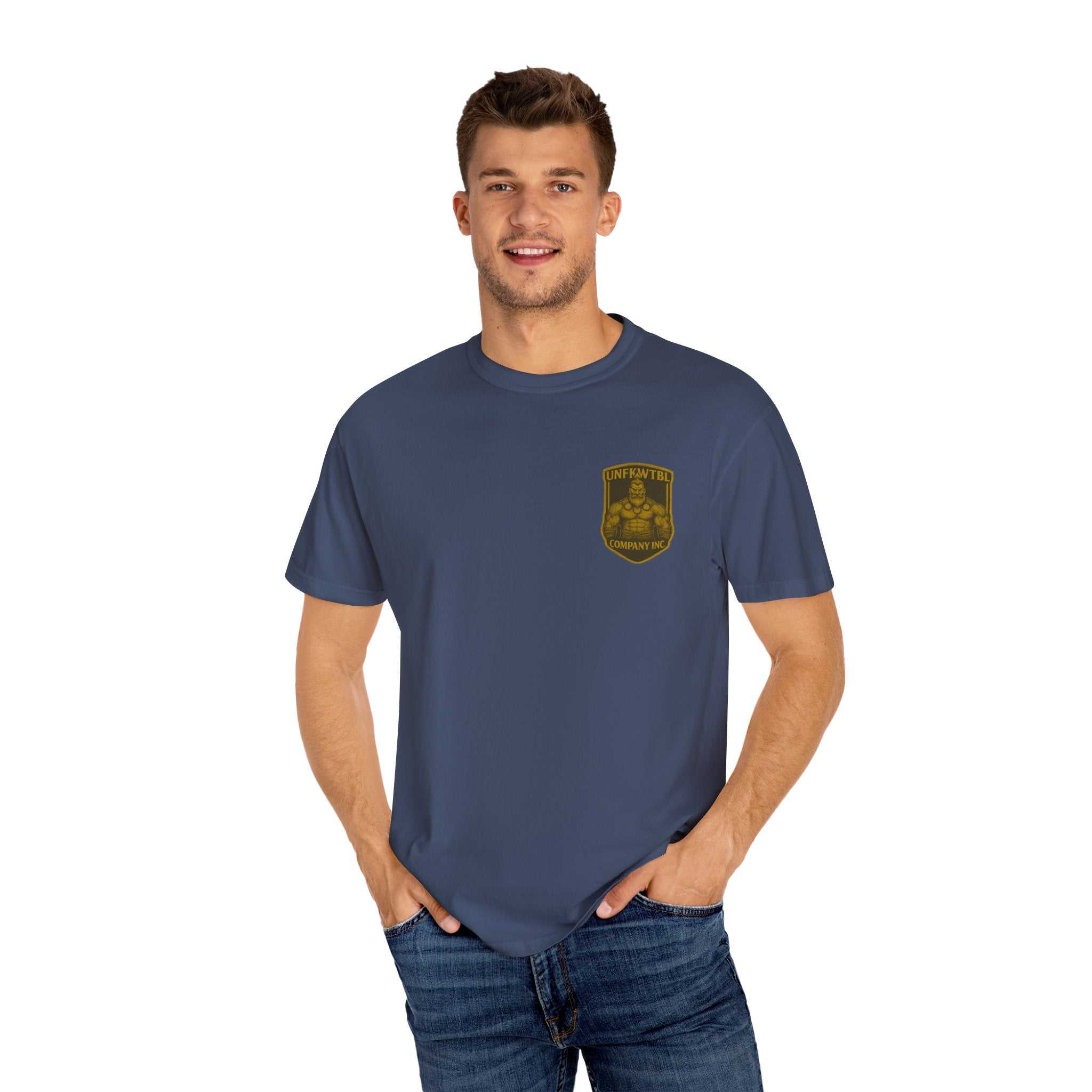 Man wearing navy Viking Warrior Unisex Tee with Viking emblem on chest and casual jeans