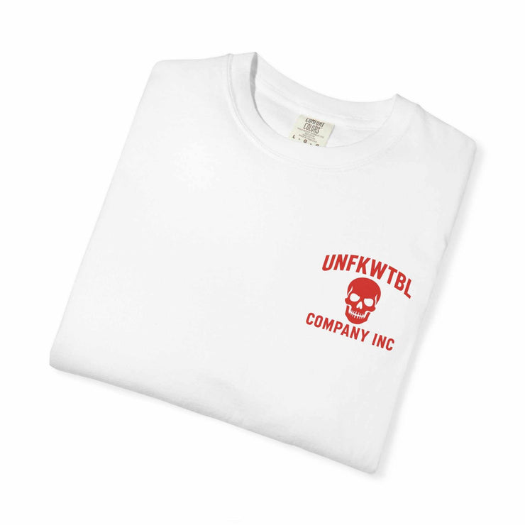 White folded graphic tee with red skull and UNFKWTBL Company Inc text logo
