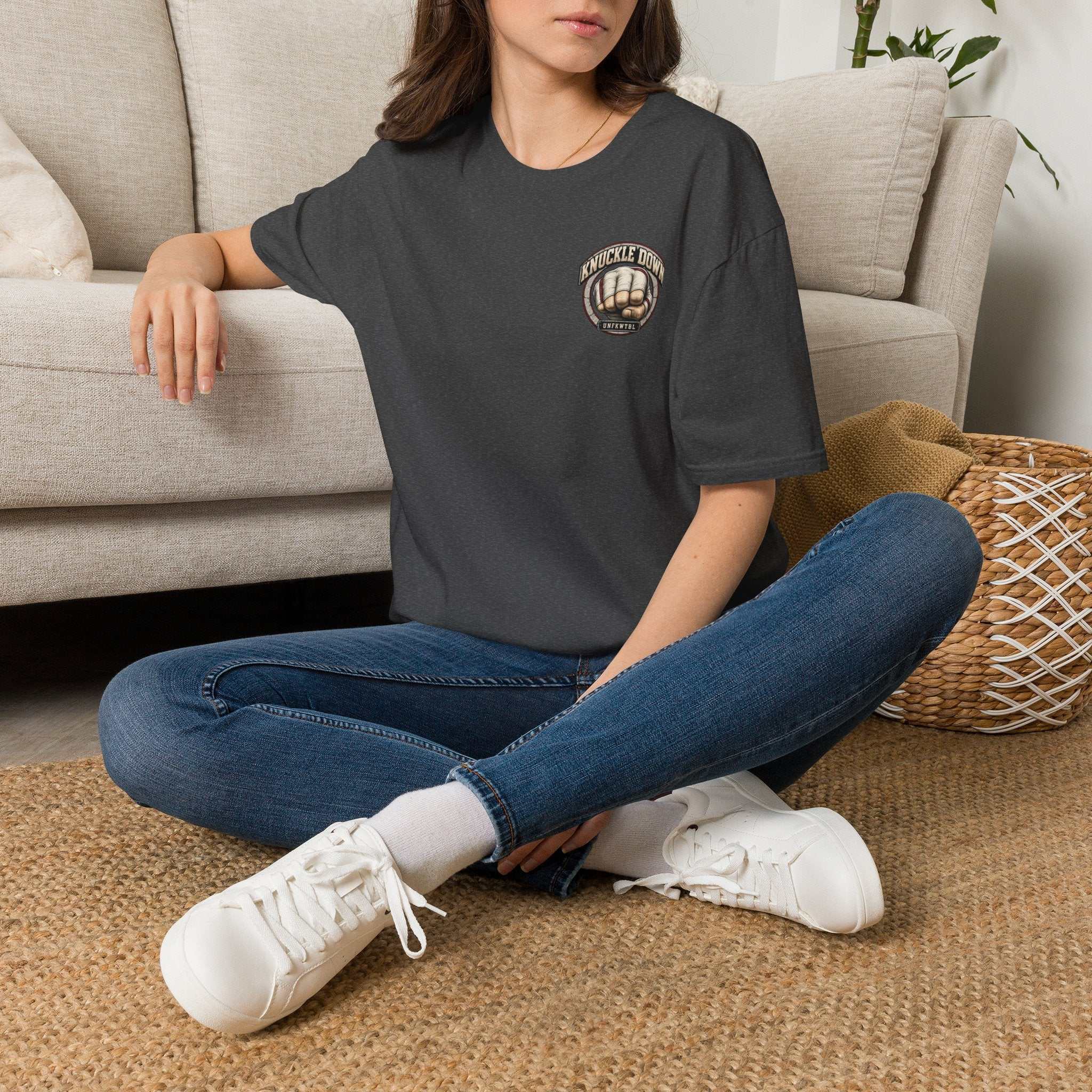 The World Swings. We Stand. Knuckle Down Tee