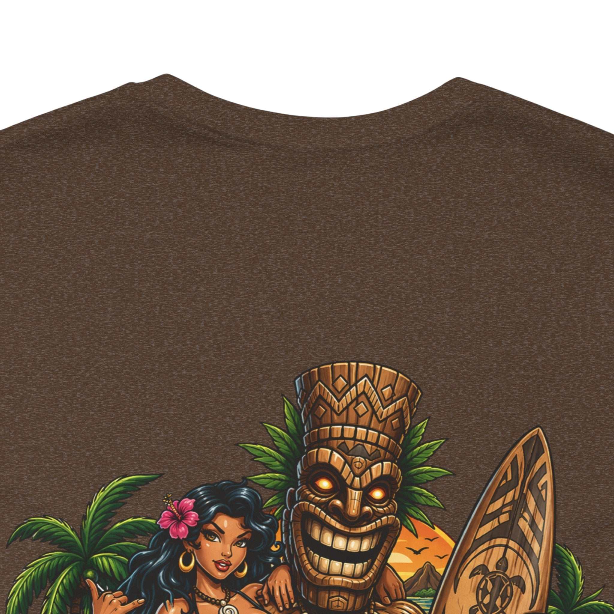 Men's Tropical Tiki Tee with tiki, hibiscus flowers, and waves design on the back, made from soft cotton.
