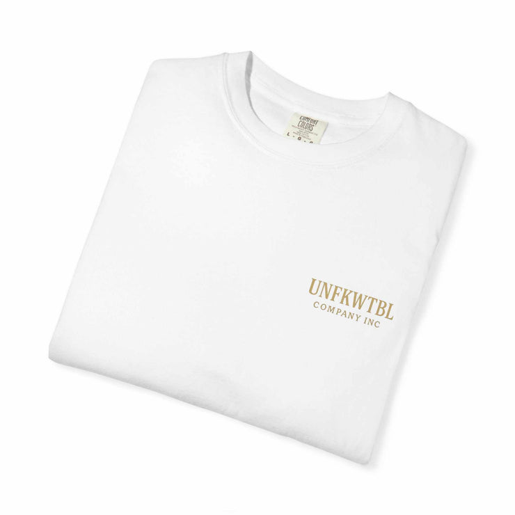 White folded Medusa Beauty unisex T-shirt with small UNFKWTBL Company Inc logo print on chest