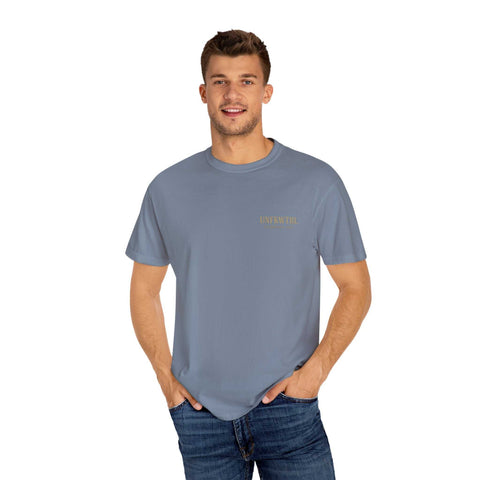 Medusa Beauty Unisex T-shirt in blue with small front logo, styled casual fit on male model.