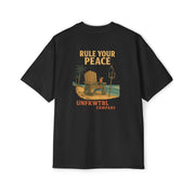 Men's heavy oversized tee with "Rule Your Peace" graphic and beach chair design in black fabric